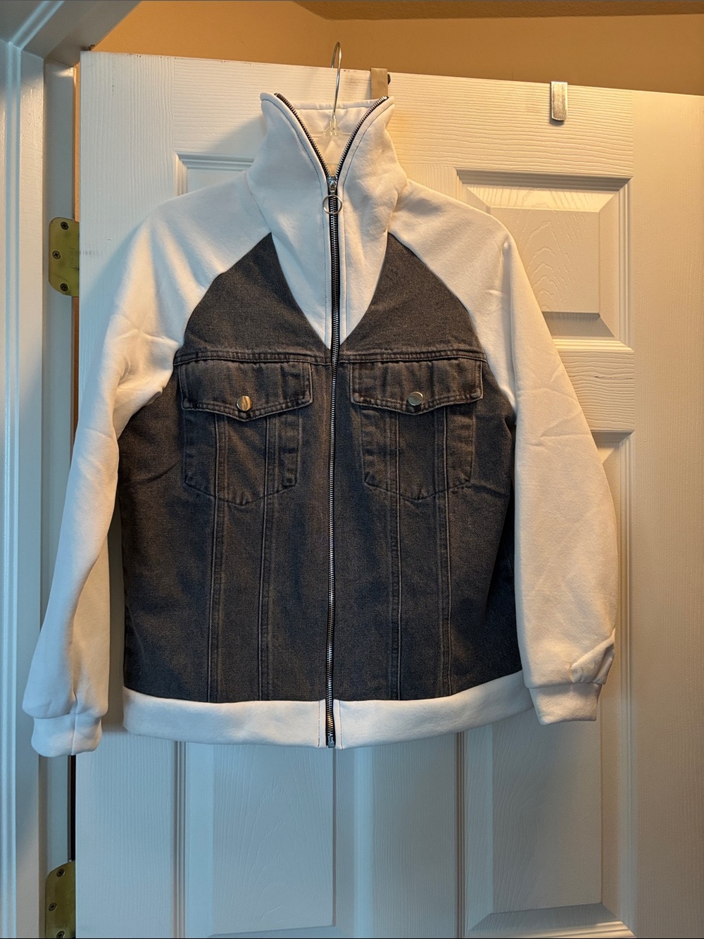 NWOT Miss Sparkling Zip Jacket. White sweatshirt sleeves, black on front & back